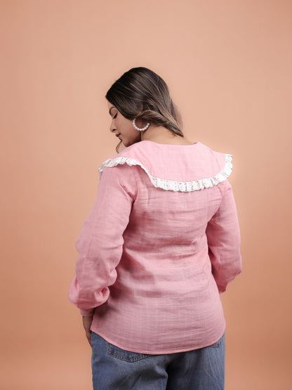 Blossom Pink Ruffle Shirt for Women featuring stylish ruffle sleeves, perfect for summer fashion. This elegant pink blouse is ideal for casual outings or formal occasions, easily paired with skirts, trousers, or jeans for versatile outfit options.