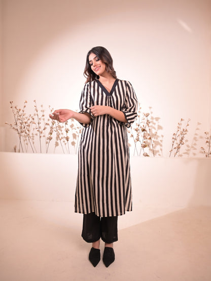 Jasmin Black and White Striped Block Printed Kurta Pant Set featuring a straight kurta and pants with pockets, perfect for stylish everyday wear.